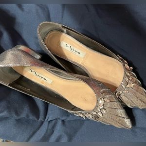 Women’s silver flats